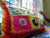 a colourful crochet cushion on display at 2013 Open Day