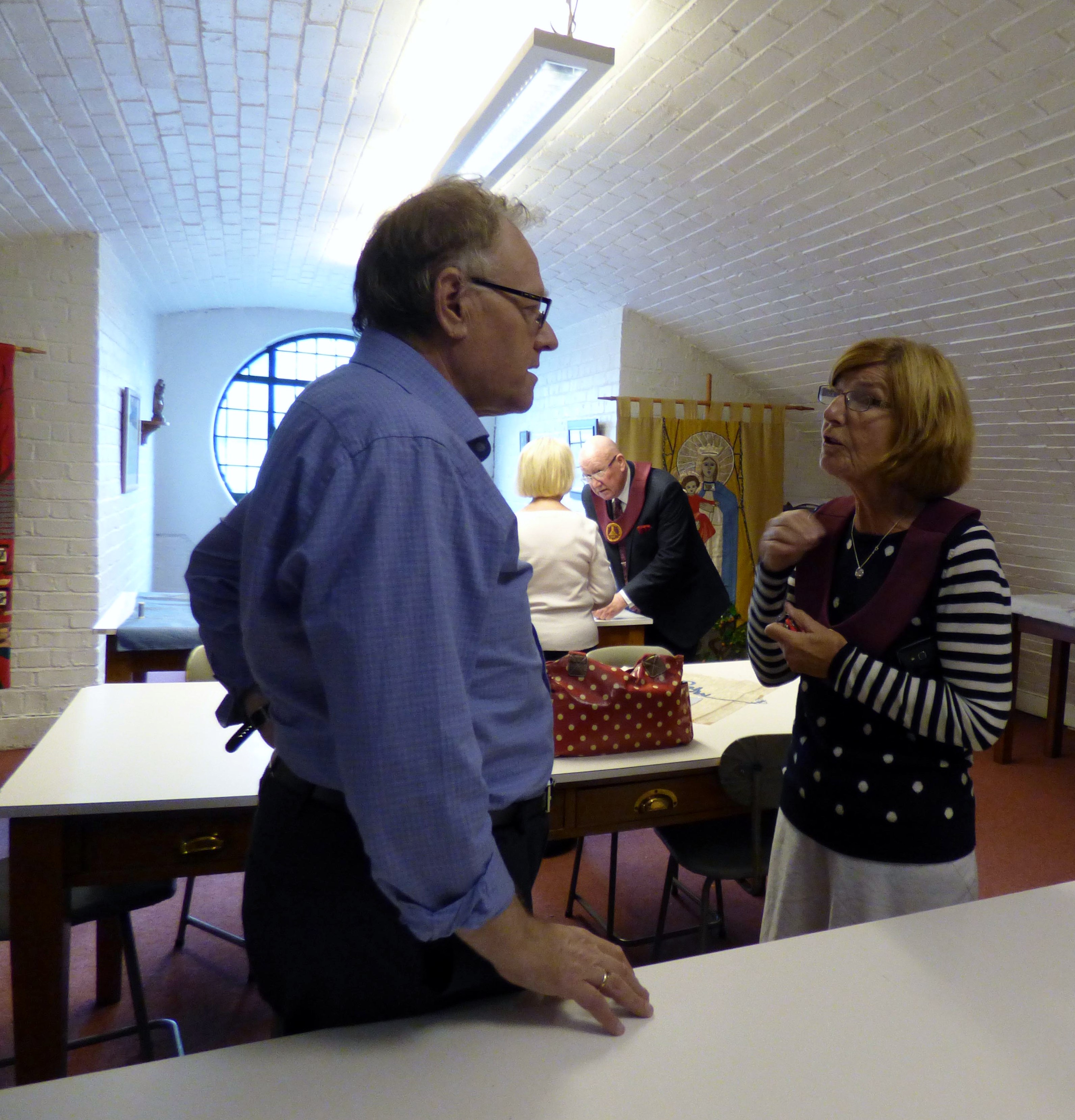 David Peglar, Embroidery Studio director with visitors to studio open day, L:iverpool Metropolitan Cathedral 2017