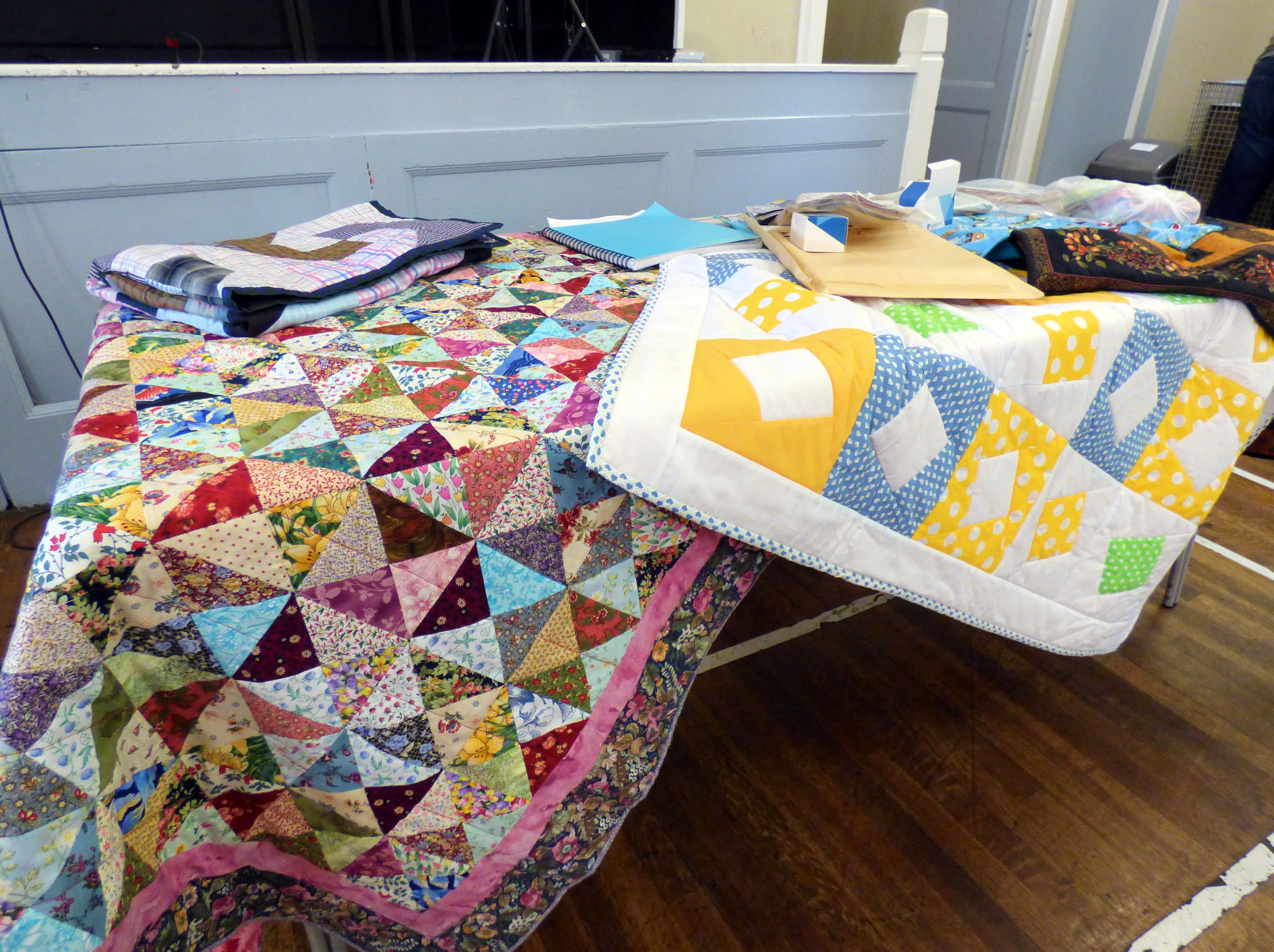 donated quilts and blankets at Talk by Caroline Fogell from Project Linus