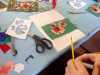 Richard Box "Poppies" workshop at MEG. The flowers are assembled and attached to the background ready for stitching