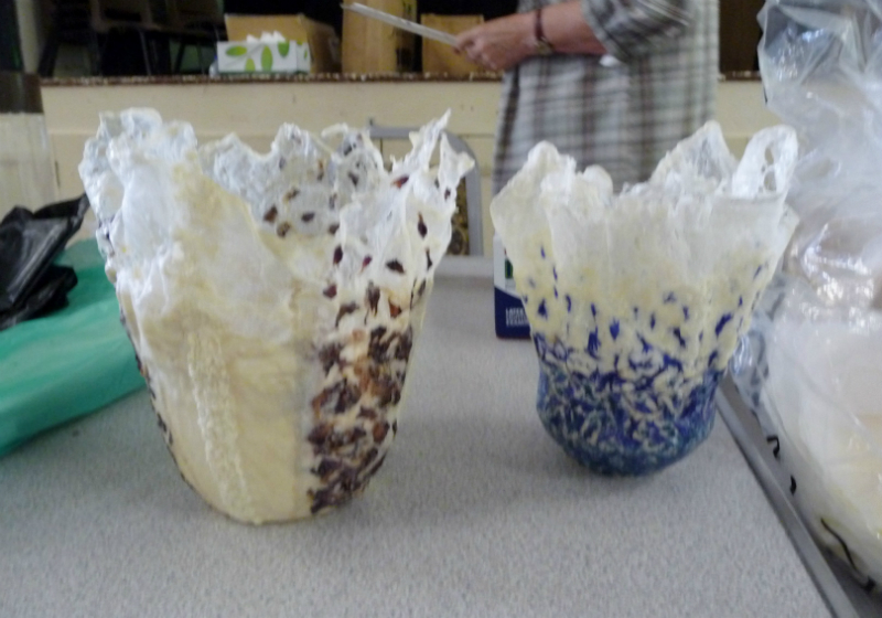 Silk paper vessels made by Linda Rudkin with dried flower petals incorporated