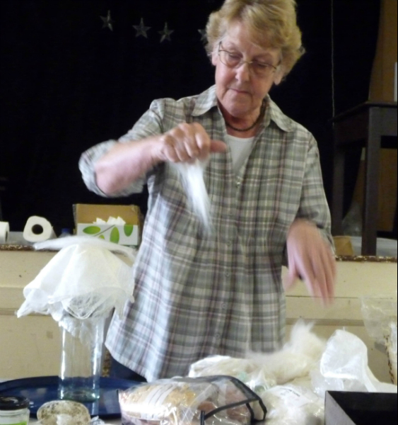 Linda Rudkin is showing us how to construct a 3D vessel from silk fibres