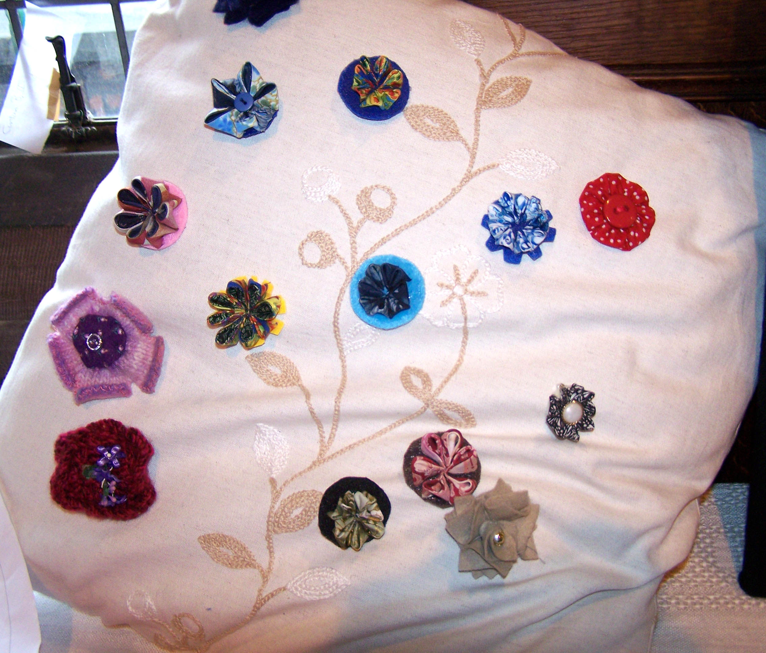 lots of fabric brooches made at the 2013 Japanese Day Workshop