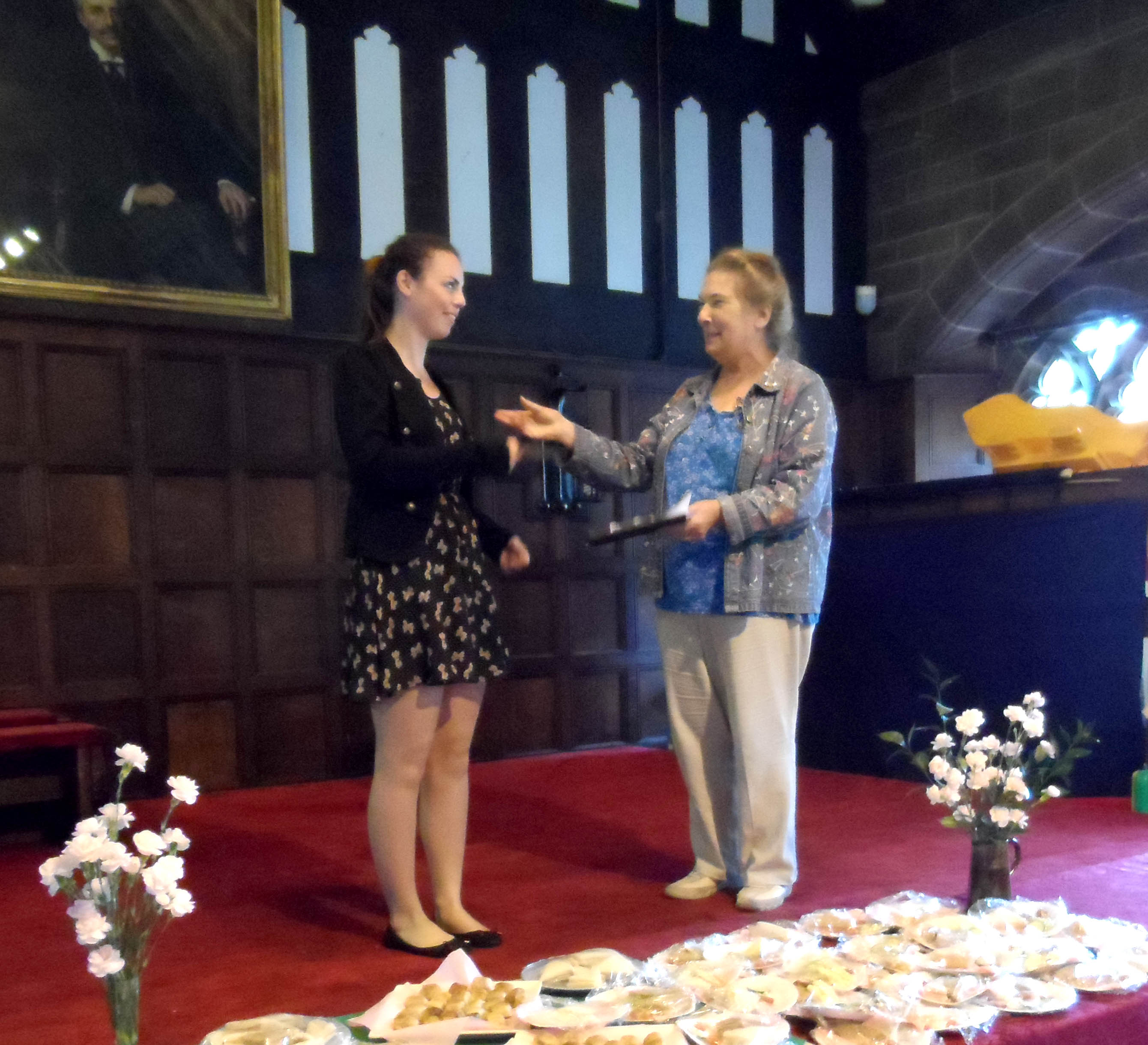 Vicky is presenting Hannah Roberts with her Bursary cheque