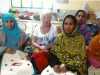 village mothers with their shoe bags finished, Sreepur, Bangladesh