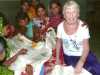 girls of Sreepur Village are stitching the background to the Flower Quilt 2014