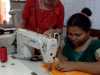 This is Parul in Sreepur Bangladesh, who is sewing on an industrial machine that Ruby had adapted for her