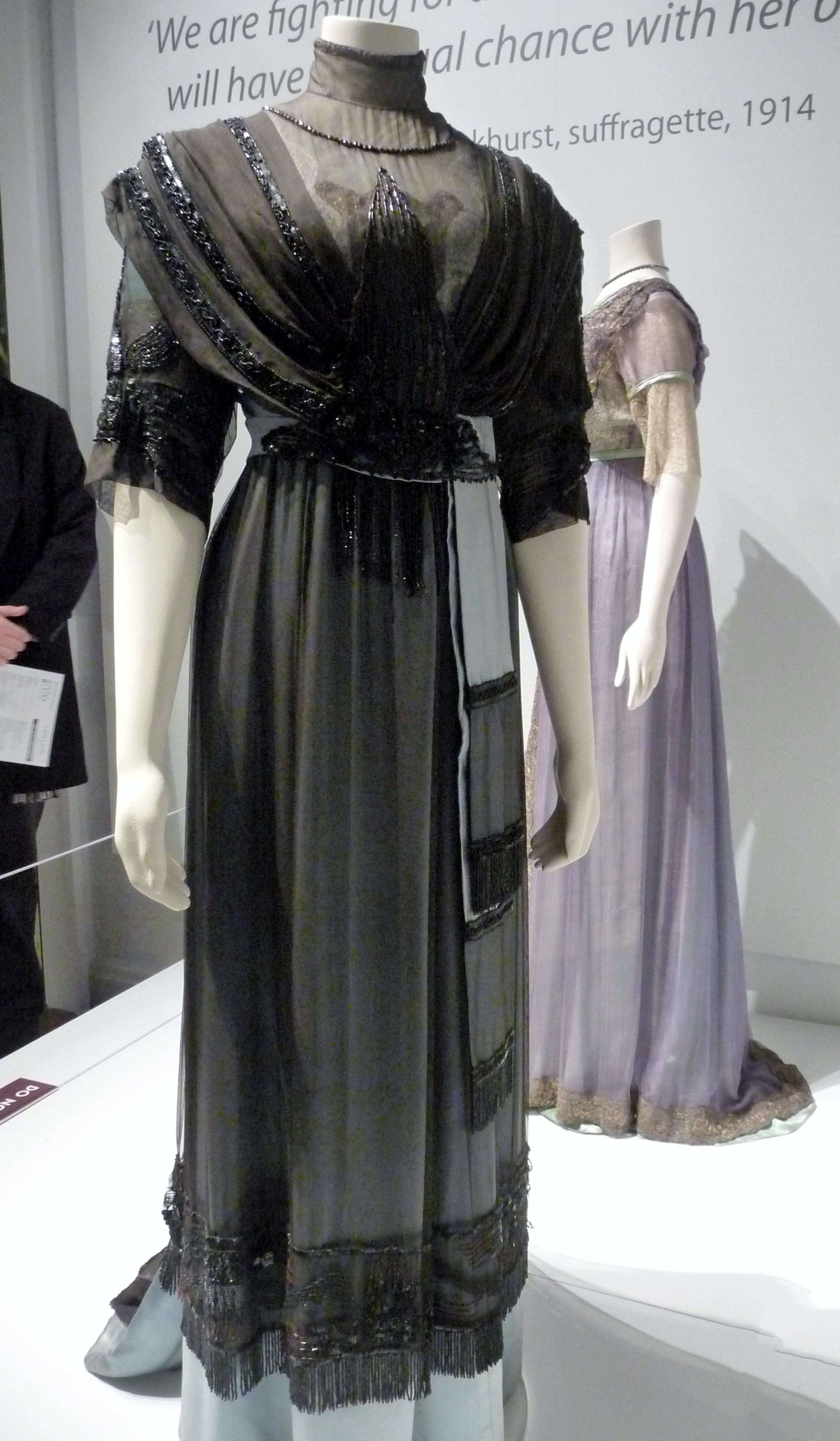 EVENING DRESS WITH TRAIN, silk satin, silk chiffon and marquisite net, trimmed with celluloid sequins and glass bugle beads, made by T&S Bacon, Liverpool, 1910-12.