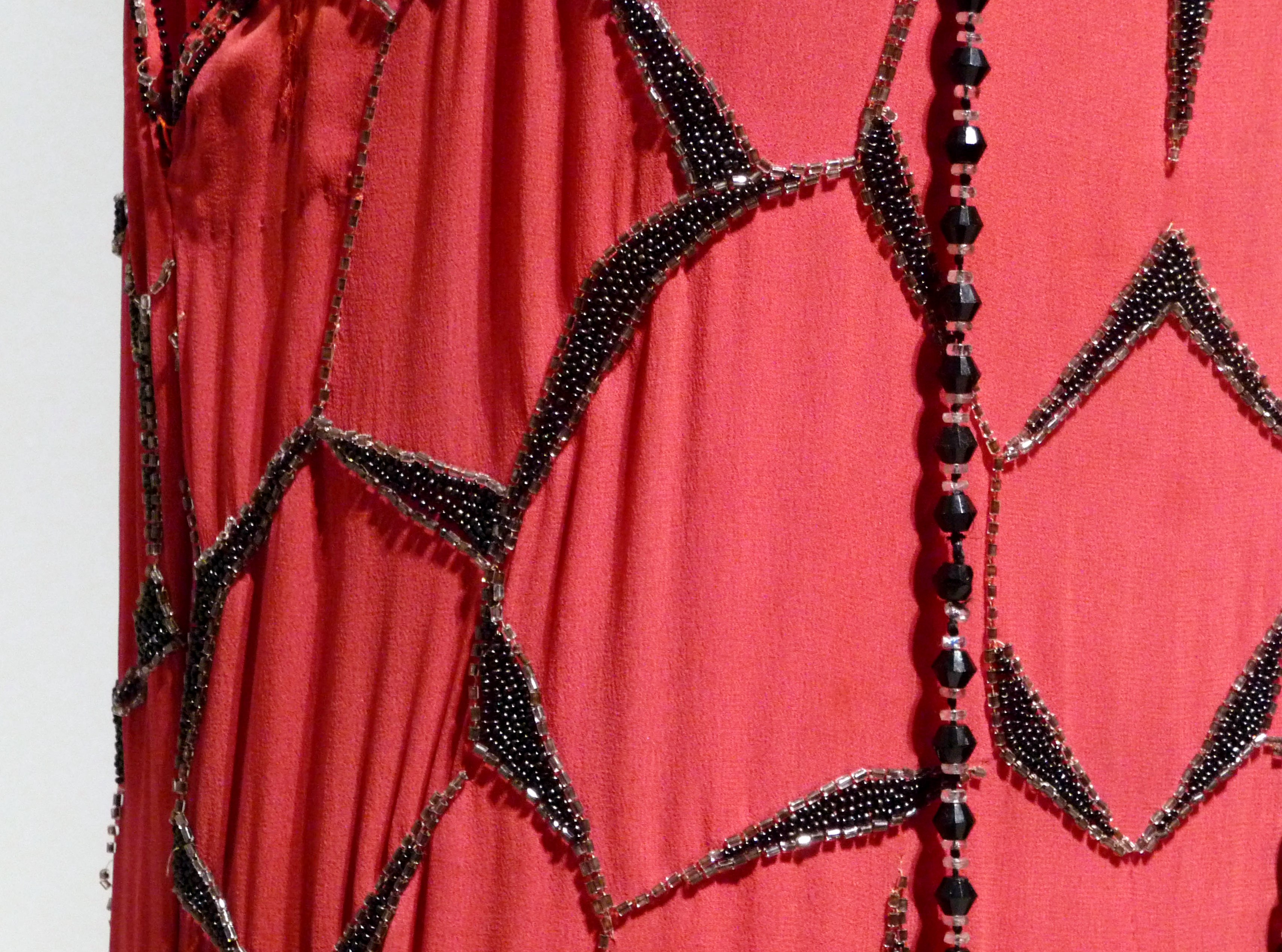 (detail) EVENING DRESS, silk crepe with applied glass bugle beads, made by Cosprop, 2012. Worn by Michelle Dockery as Lady Mary Crawley in Downton Abbey.