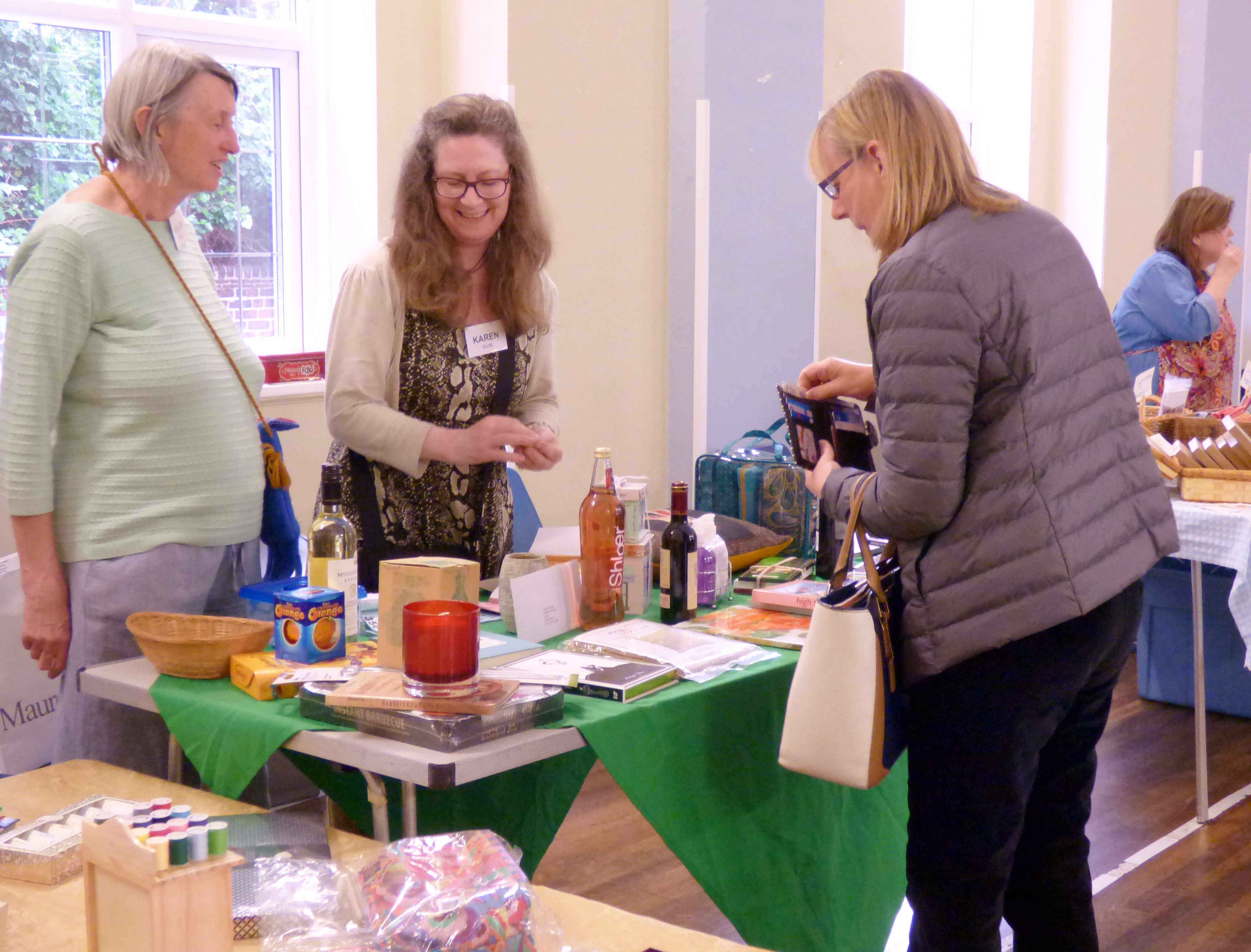 this is Helen and Karen with the Raffle Table at MEG Summer Tea Party 2017