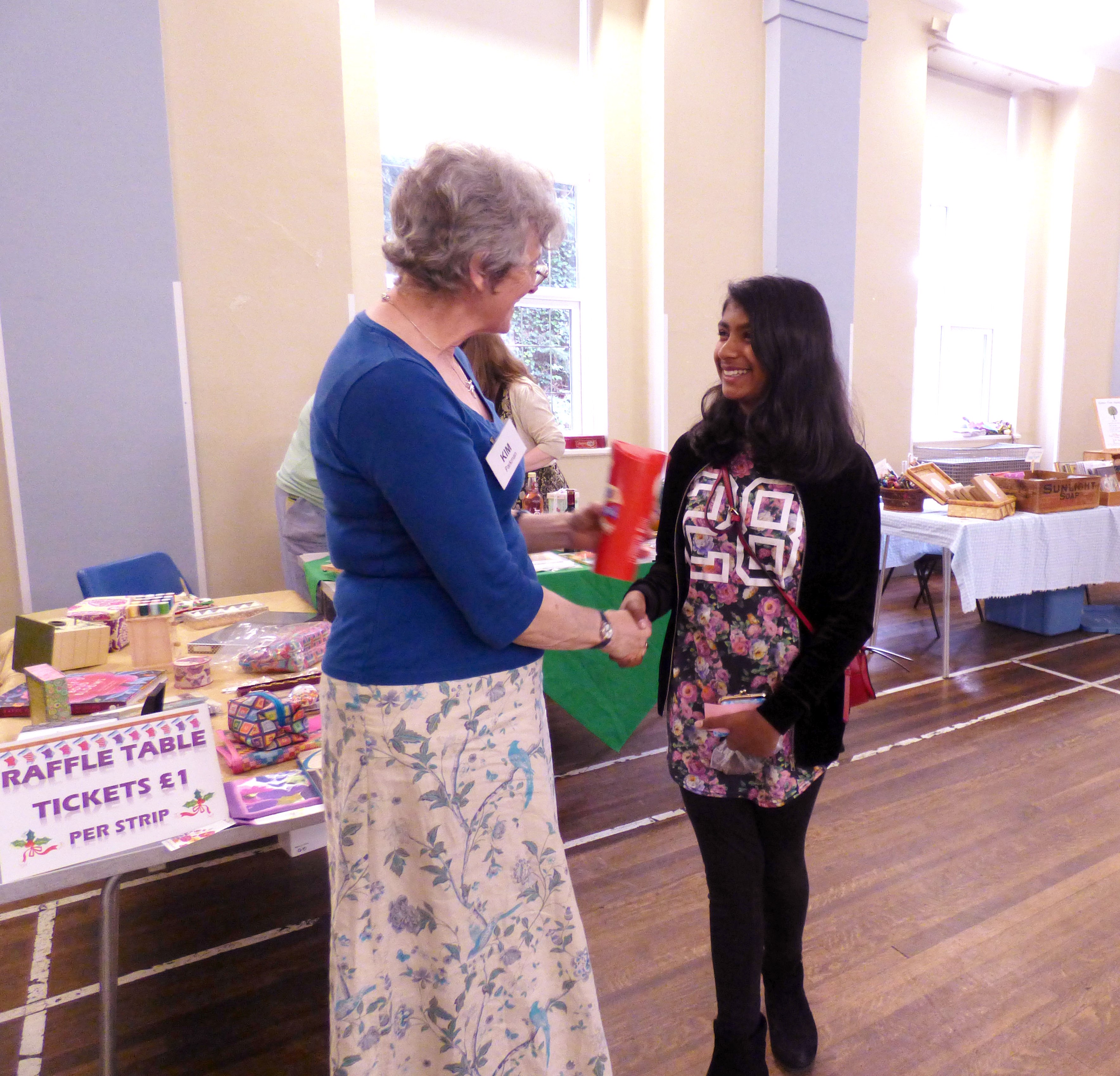 Grace receiving a prize for her YE cushion embroidery at MEG Summer Tea Party 2017