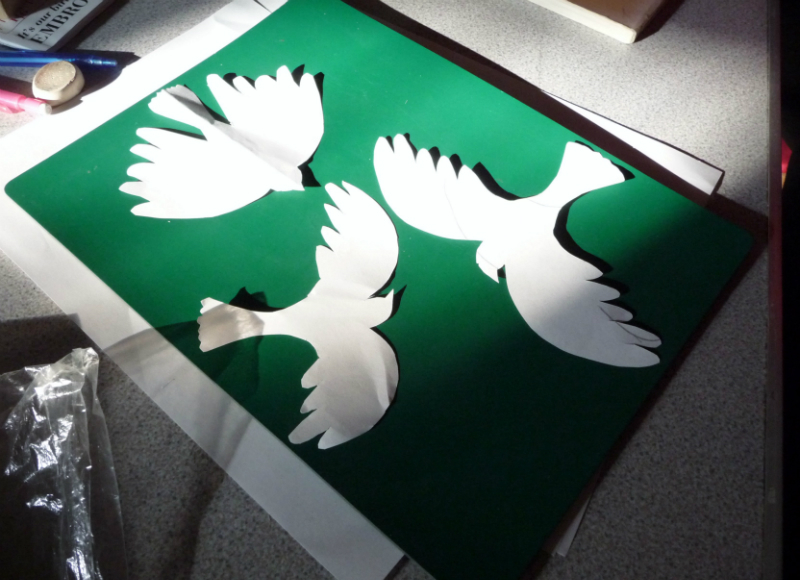 Paper stencil cut ready for screen printing