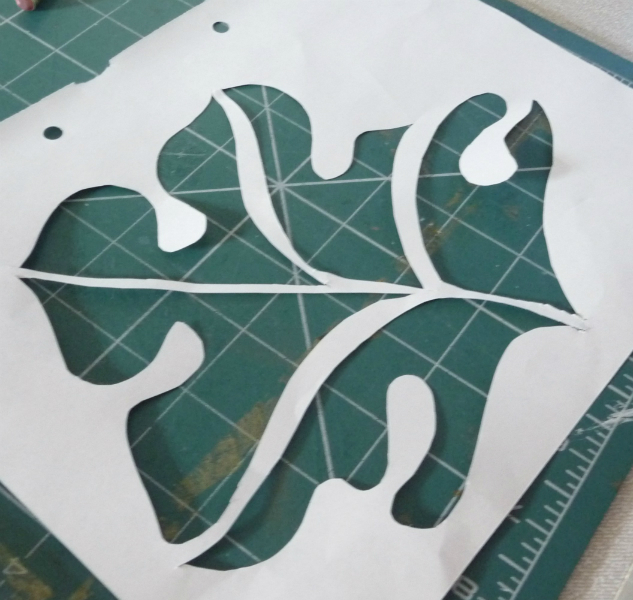 Paper stencil cut ready for screen printing
