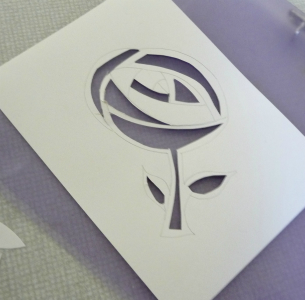 paper stencil cut out and ready to be screen printed