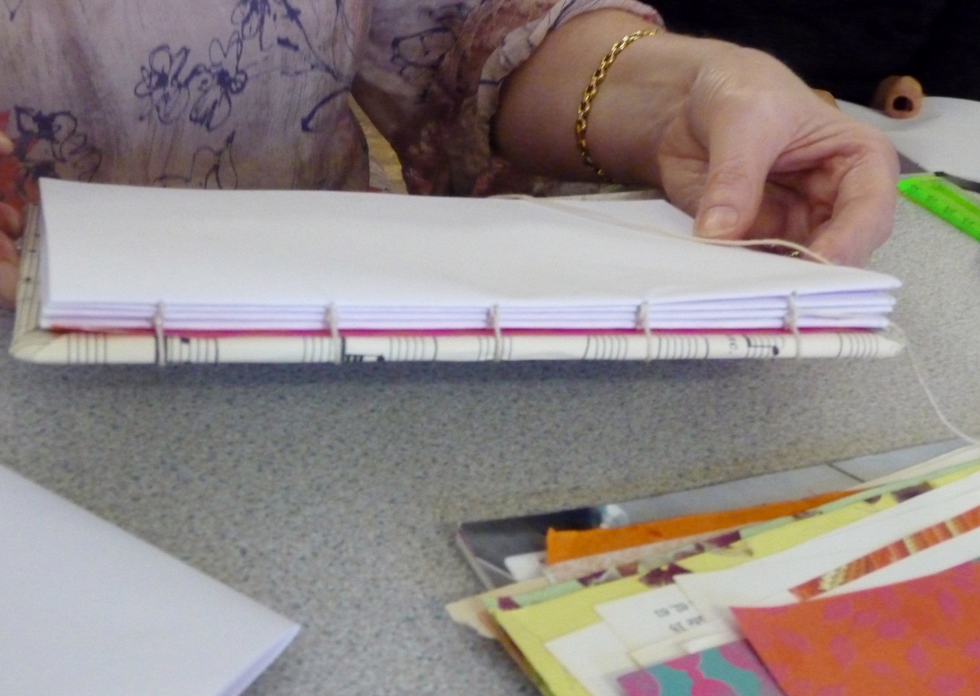 Bookbinding workshop- sititching the signatures to the cover