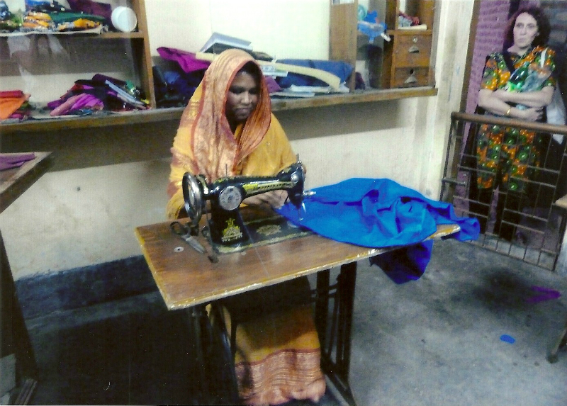 One of the Sreepur village mothers is making Ruby a cotton skirt