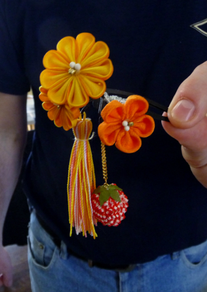 Japanese hair ornament made using Kanzashi flowers in the design