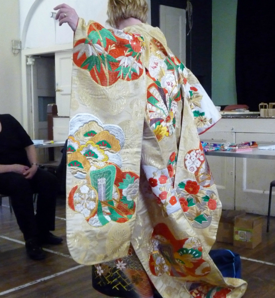this is an expensive overgarment , worn over the kimono, used at a wedding