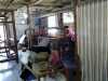 A loom in the new weaving shed, Sreepur, Bangladesh. Weavers are making striped fabric.