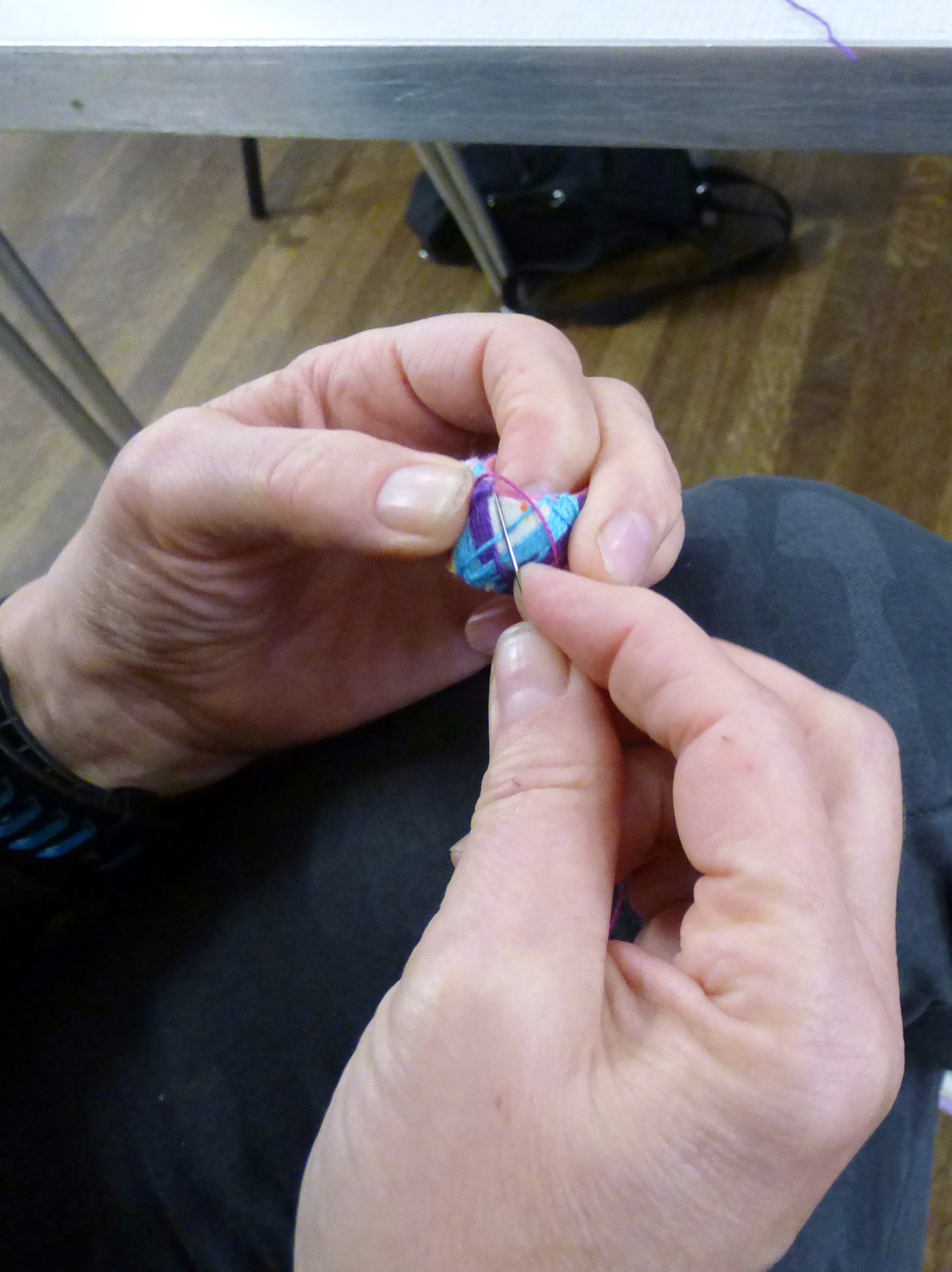 stitching nearing completion at Kathryn Thompson's "Japanese Thimbles" workshop