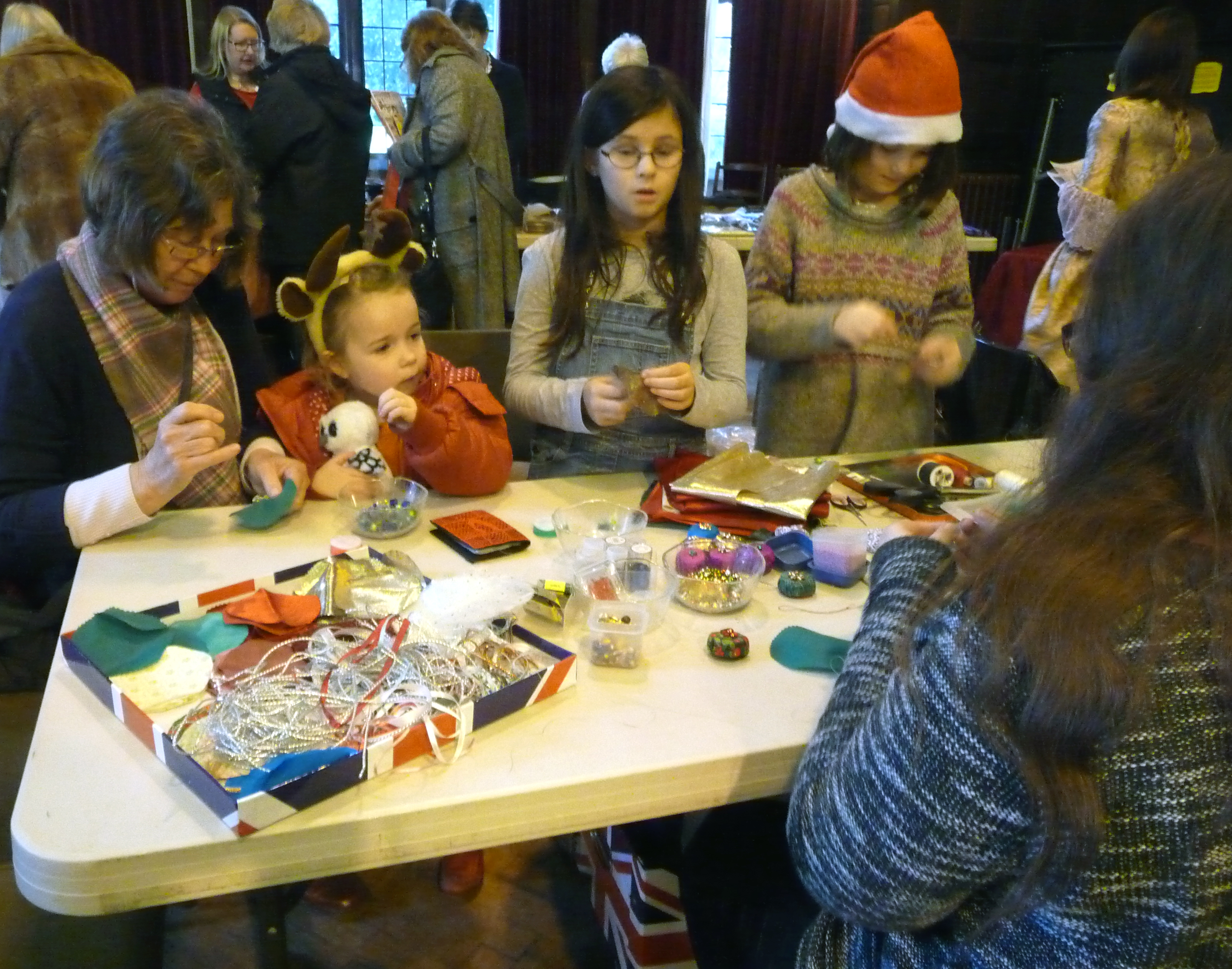 YE members enjoying Make & Take Christmas activity at MEG Christmas party 2014