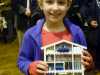 Emma Lewis with her prizewinning "Home From Home" at MEG Christmas party 2014