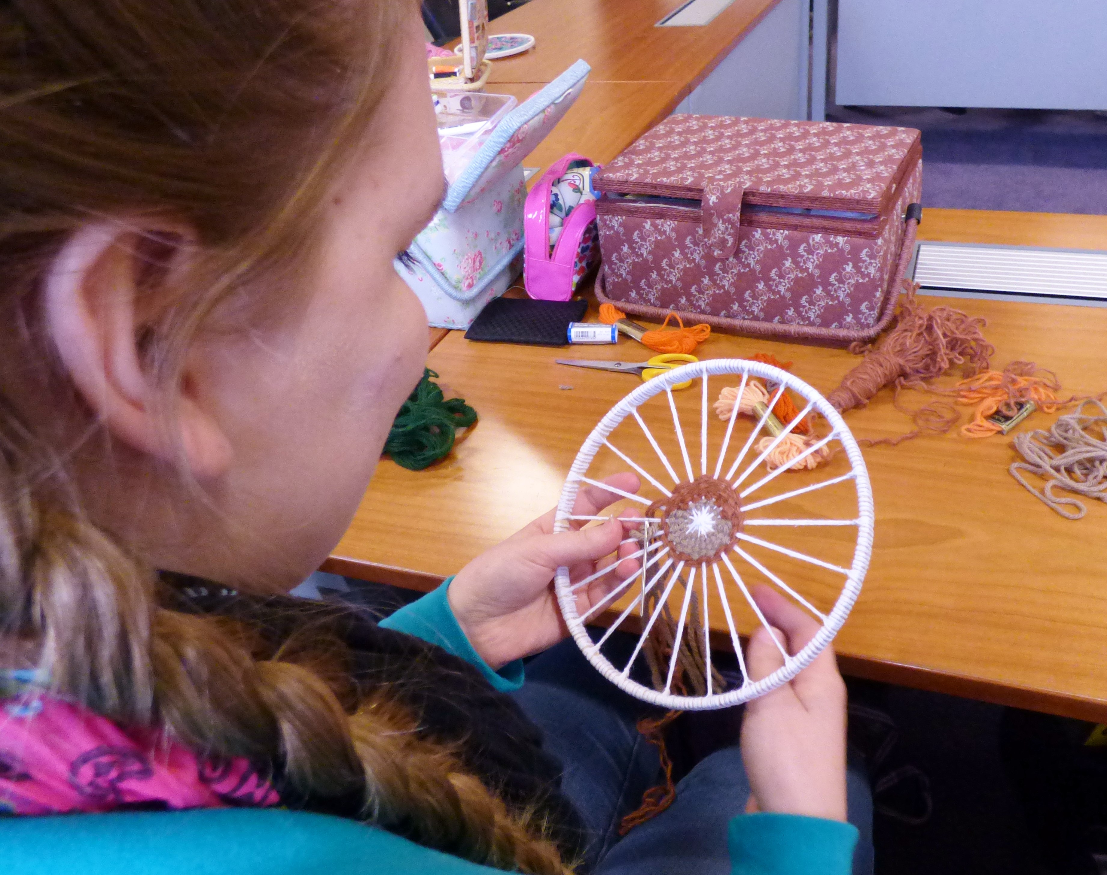 YE group are making a circular weaving with added embroidery
