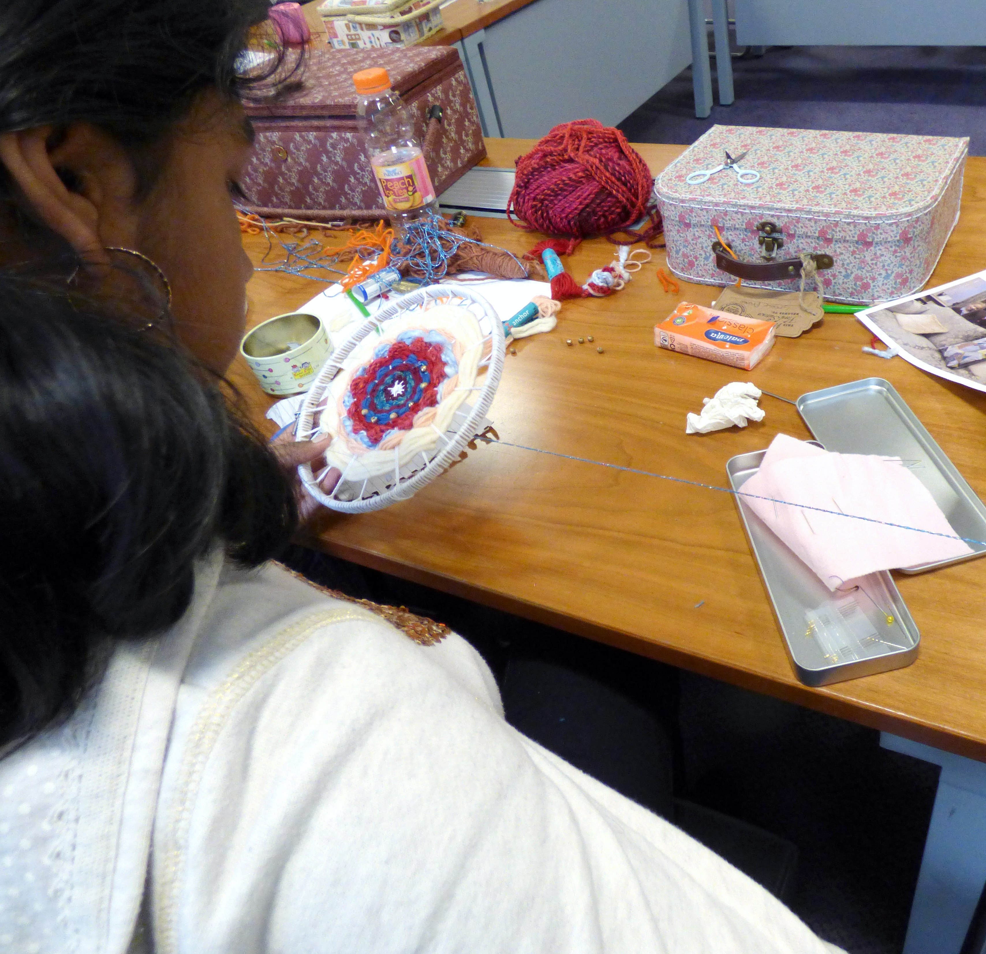 YE group are making a circular weaving with added embroidery