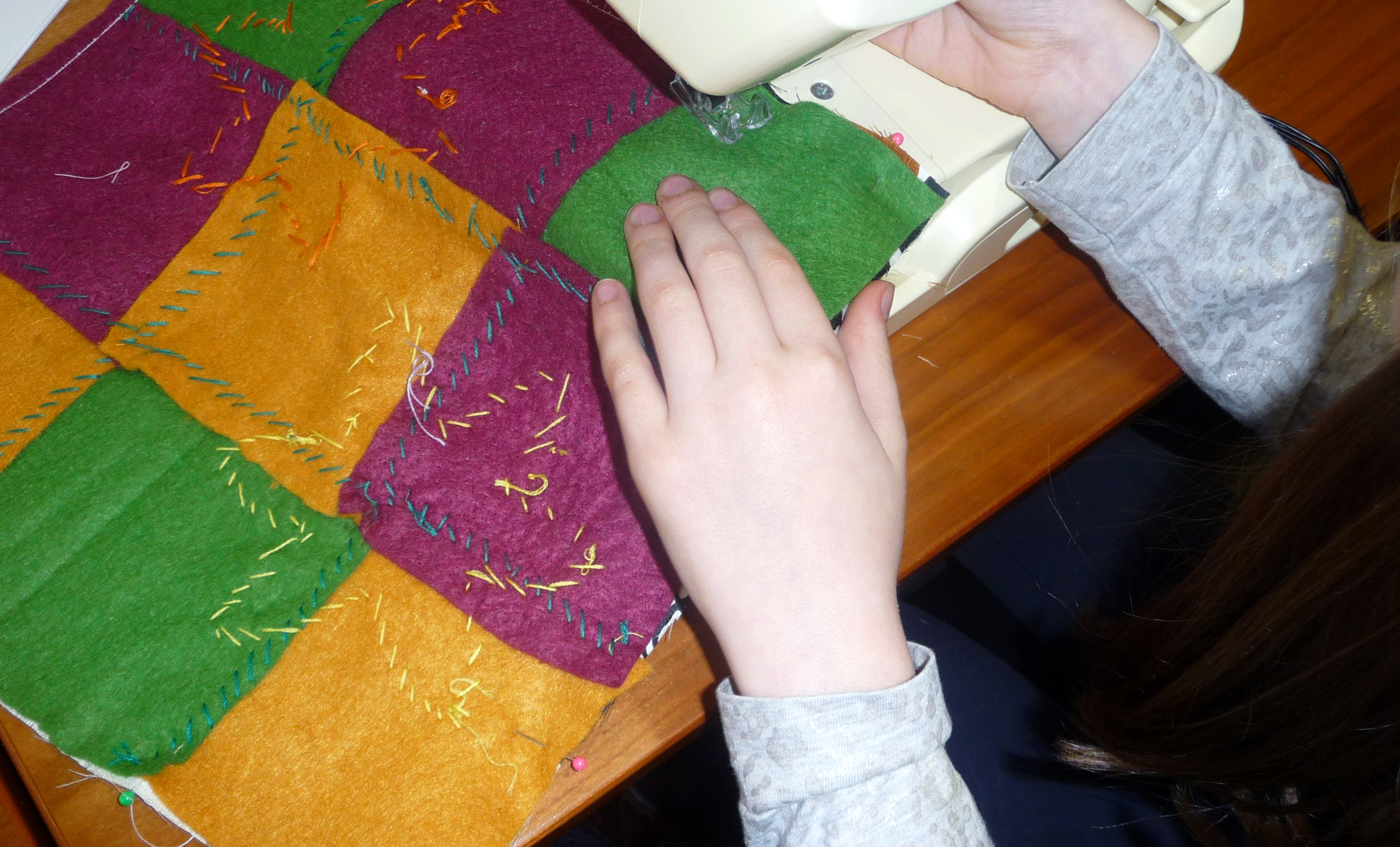 we used the sewing machine to join back and front of the cushion together during YE group meeting in March 2015
