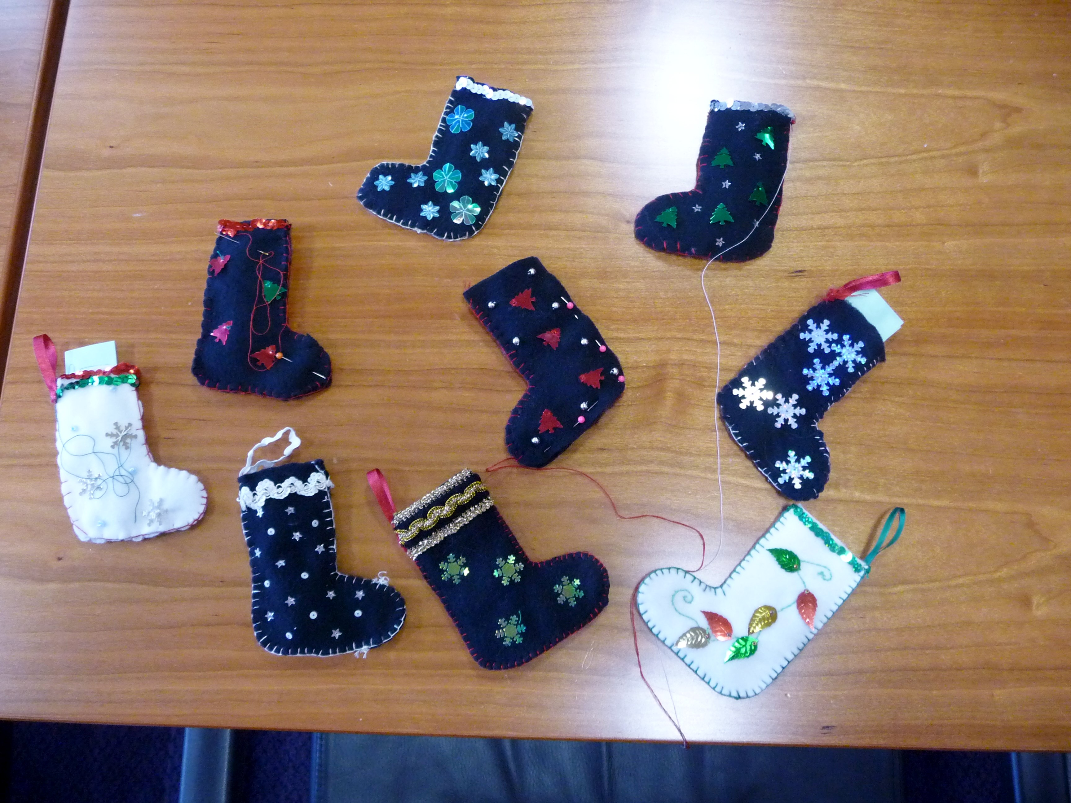 this is the other side of the collection of needle-felted Christmas stockings made by Merseyside YE
