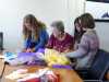 a busy YE Group making chiffon flowers