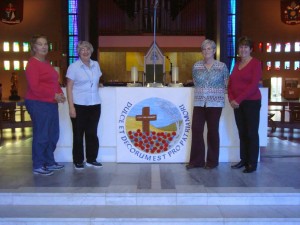 Altar frontal in Liverpool Metropolitan Cathedral with some of the people who embroidered. Oct 2014
