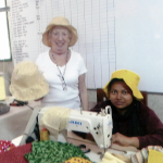 Ruby Porter MBE and Paural with the sunhats, made for a UK order in Sreepur, Bangladesh