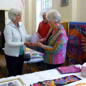 Elsie Watkins, winner of the 2013 Colour Competition, receiving the Edna Billison Glass Trophy from Ruth Isset