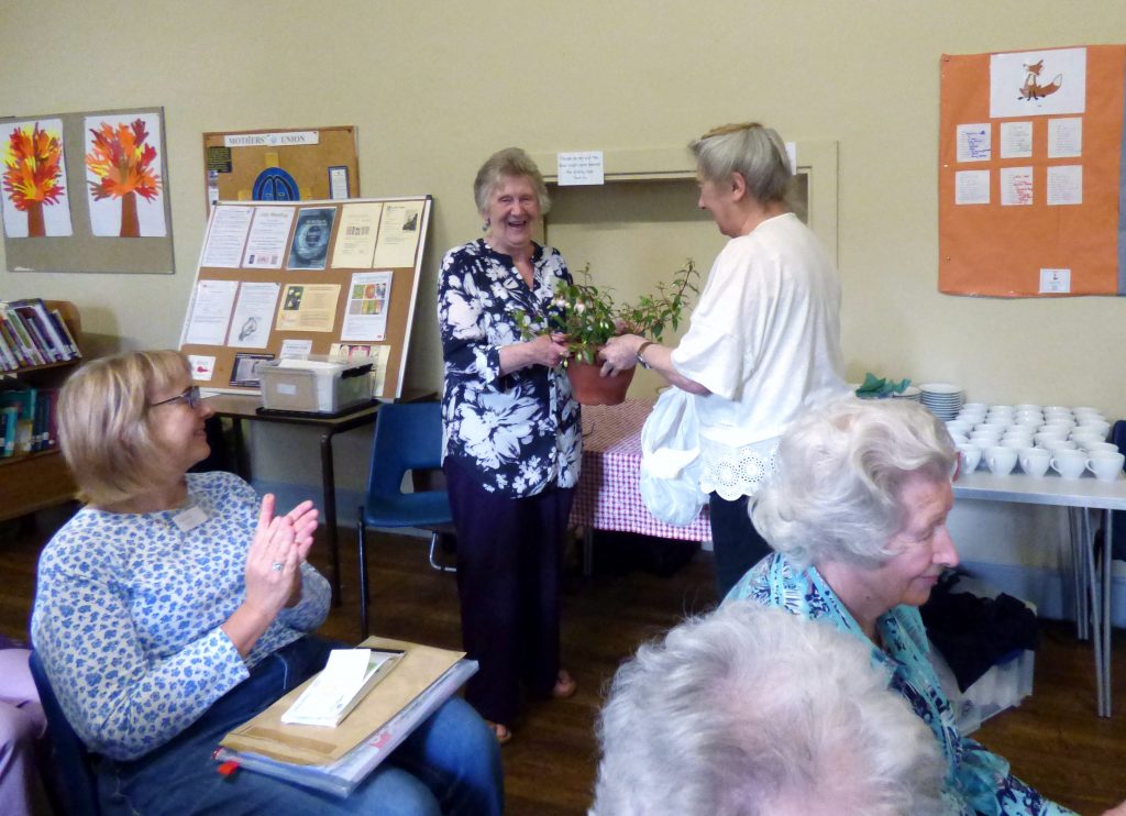 Val Heron, YE Leader, is presented with a gift in recognition of YE achievements in NW Regional Day 2018