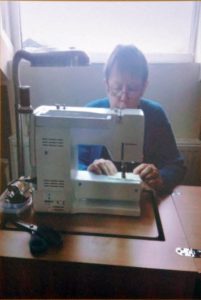 Marie at the sewing machine