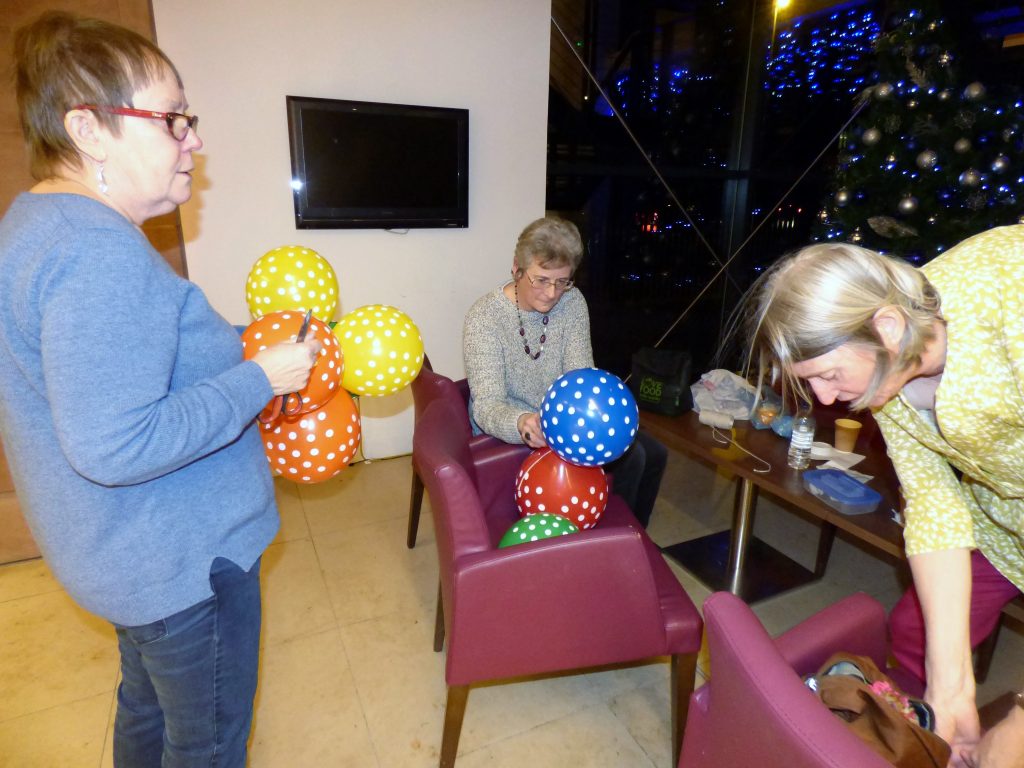 Marie in the Capstone Theatre organizing the Kaffe Fassett lecture in 2016