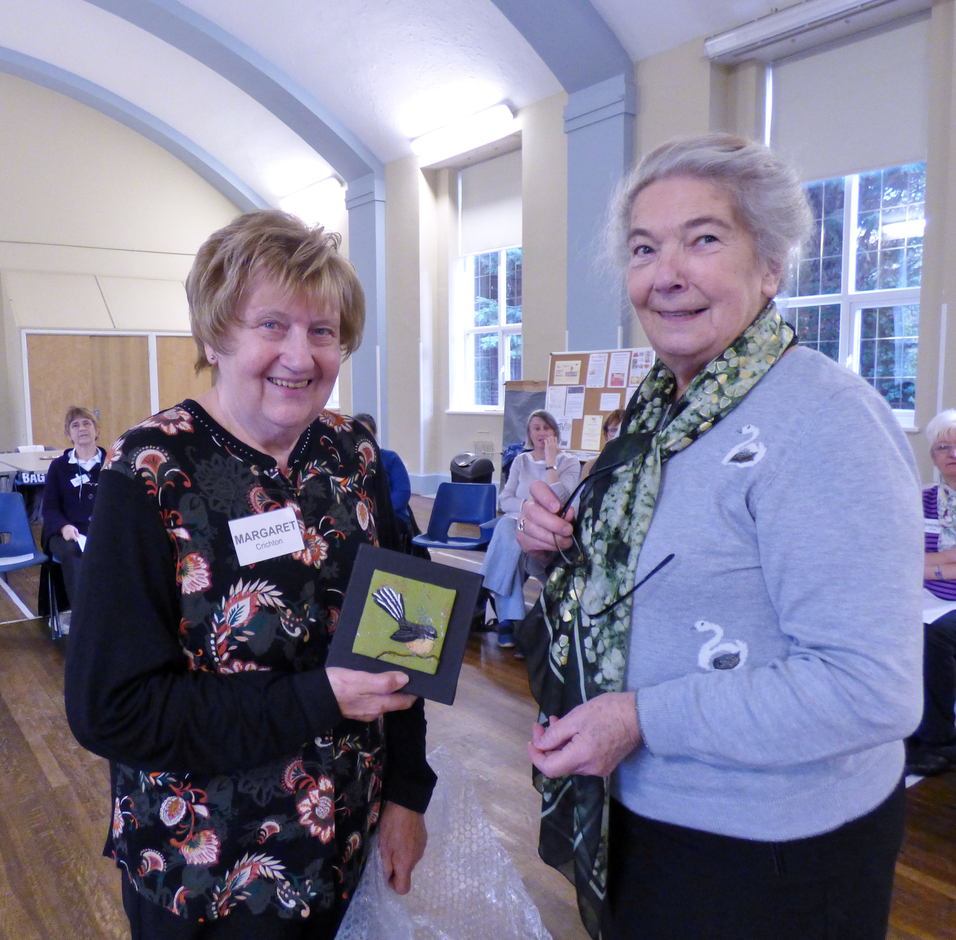 Margaret Crichton was placed second in Visitor's Vote at our Endeavour exhibition 2018. Vicky Williams presented her with an embroidered picture by Caroline Strachan