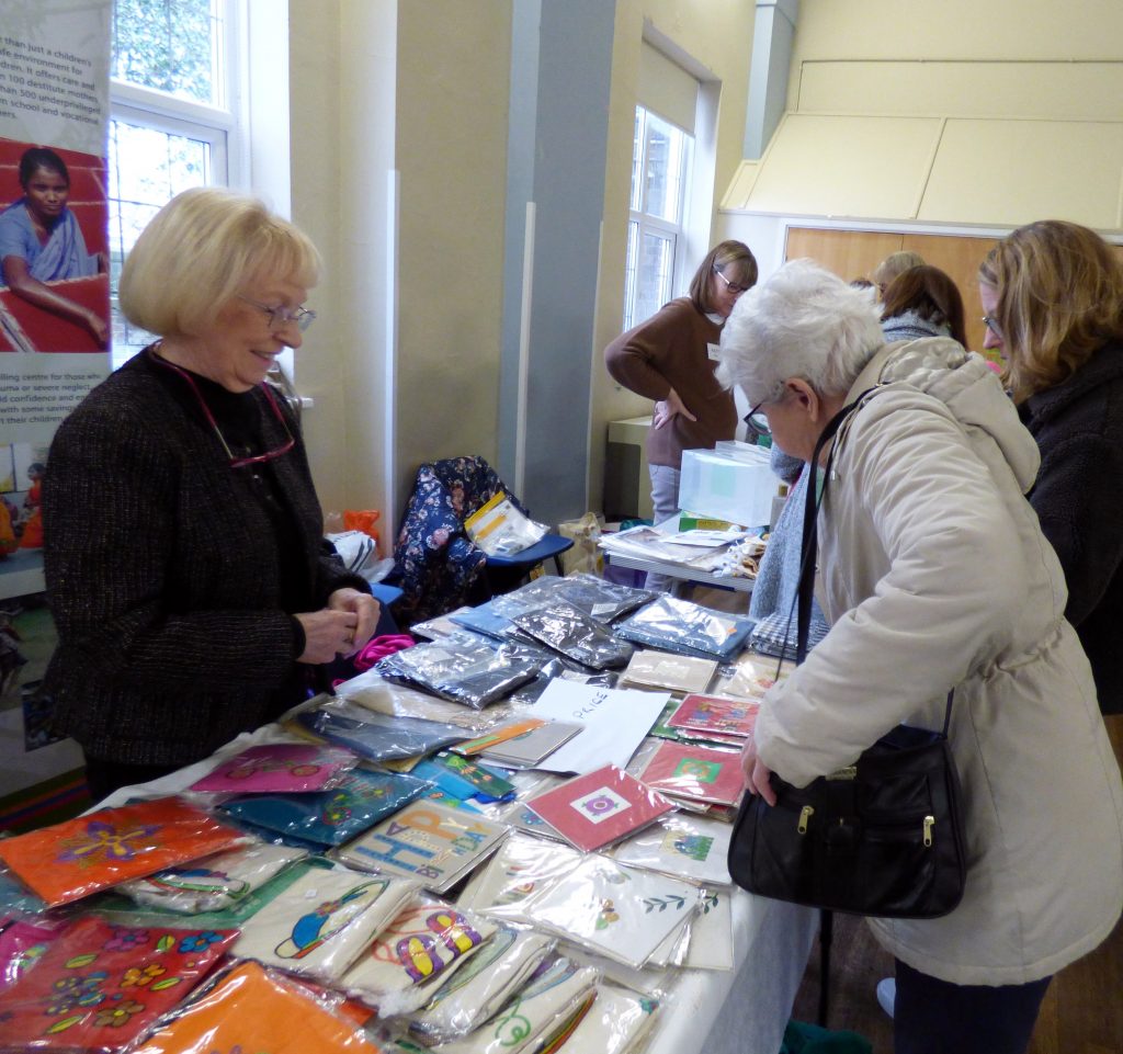 Kathy with the Sreepur stall at MEG Christmas Party 2019